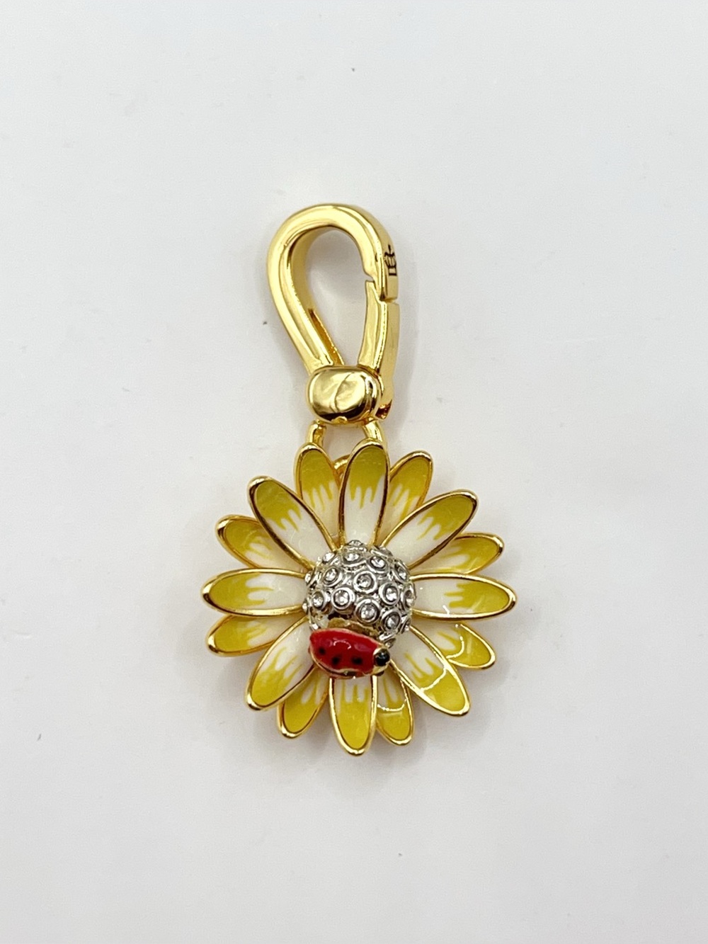 Juicy Couture daisy with ladybug charm